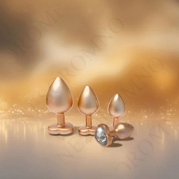 Набір із трьох анальних пробок Dream Toys Gleaming Love, розміри S, M, L, перламутрово-золоті DT22202 фото