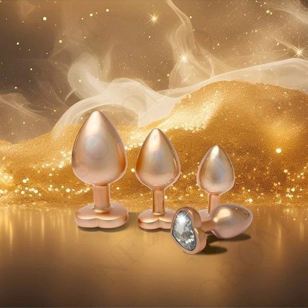 Набір із трьох анальних пробок Dream Toys Gleaming Love, розміри S, M, L, перламутрово-золоті DT22202 фото