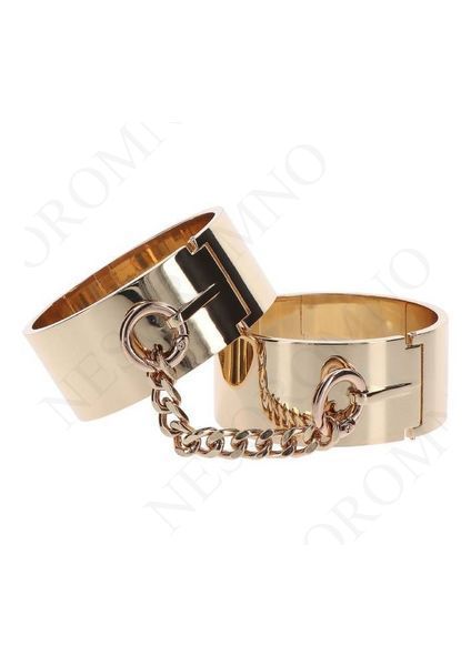 Наручники Slave Wrist Cuffs TABOOM, металеві, золотисті TB17300 фото